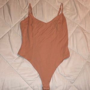 nude body suit with criss cross back